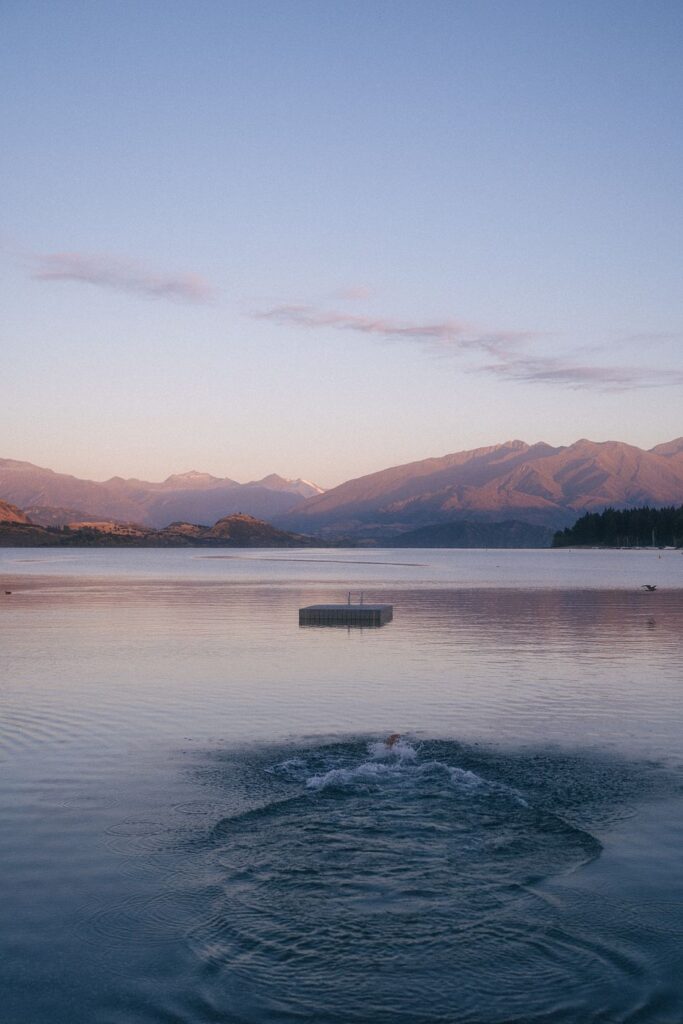 exercises for copywriting post: A beautiful scene of a lake with mountains beyond
